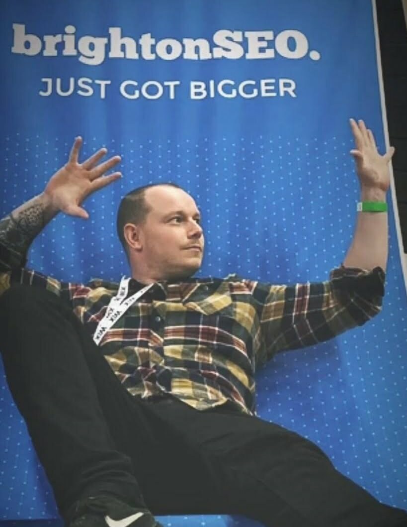 James in giant BrightonSEO chair | Fandango Digital